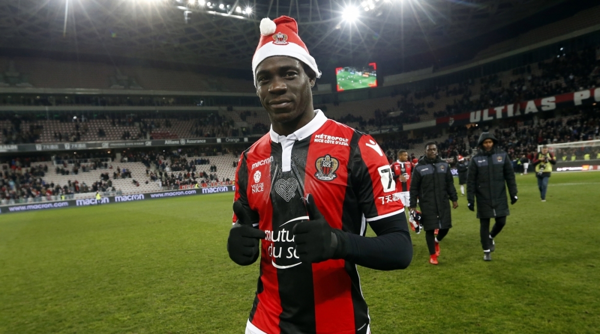 Nice's Italian forward Mario Balotelli (R) looks on after scoring a goal during the French L1 football match Nice vs Bordeaux on December 17, 2017 at the 