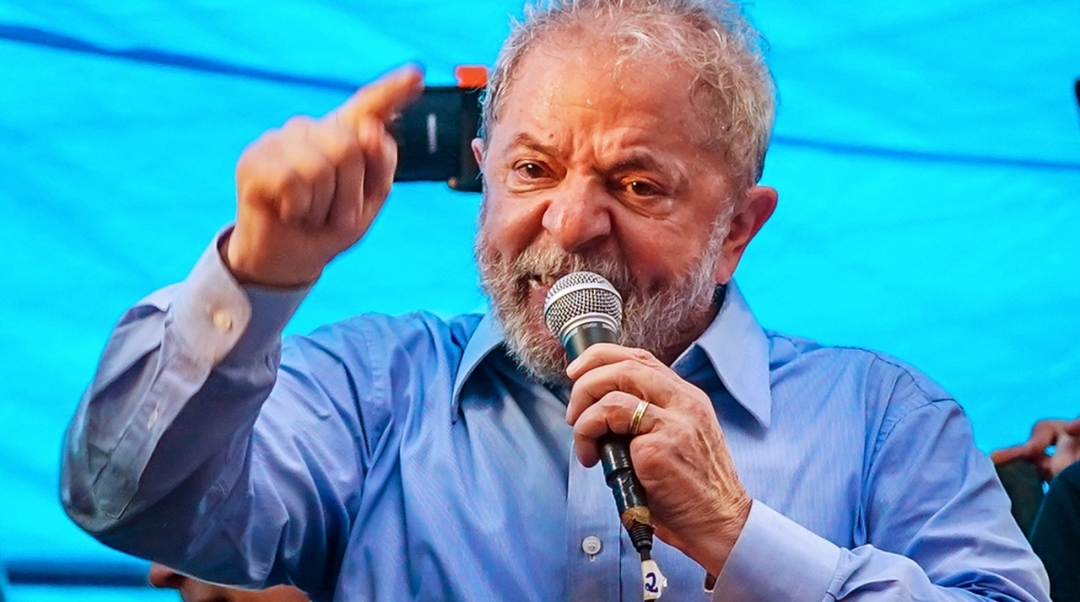 Former Brazilian president Luiz Inacio Lula da Silva speaks during a demonstration at the state of Rio de Grande do Sul, in Porto Alegre, Brazil, on January 23, 2018.                        
Lula was sentenced in July 2017 to 9.5 years behind bars after being convicted of corruption in Brazil's huge 'Car Wash' graft scandal. The court in Porto Alegre said it will rule on his appeal on January 24. That could decide whether Lula -- hugely popular during his 2001-2010 two-term presidency -- can take part in the October 2018 presidential elections in which he is currently the frontrunner. / AFP PHOTO / Jefferson Bernardes
      Caption