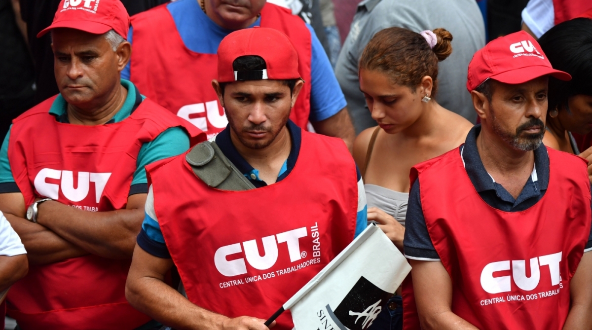 Unionists and members of social movements, show their disappointment during a demonstration in support of former Brazilian president Luiz Inacio Lula da Silva in Sao Paulo, Brazil on January 24, 2018. 
A Brazilian appeals court Wednesday upheld ex-president Luiz Inacio Lula da Silva's conviction for corruption, effectively ending his hopes of relection this year. Two of the three judges in the appeals court in the southern city of Porto Alegre ruled that his original 9.5-year jail sentence be extended to more than 12 years.
 / AFP PHOTO / NELSON ALMEIDA
      Caption