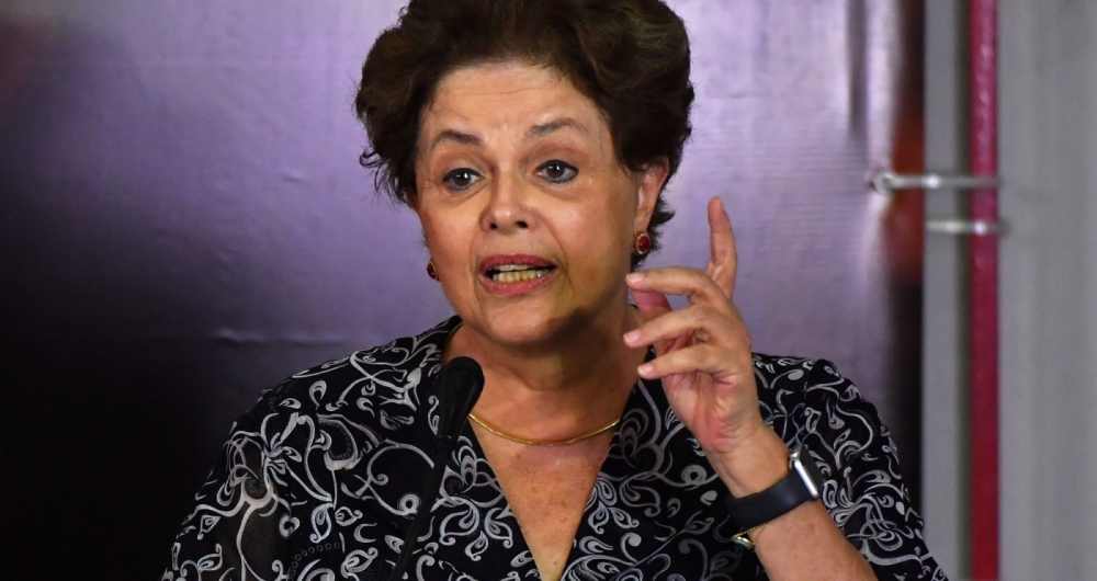 Former Brazilian president Dilma Rousseff  speaks during a campaign rally to launch Lula's presidential candidacy for the upcoming October elections, at the Workers Central Union (CUT) headquarters in Sao Paulo, Brazil on January 25, 2018.
A Brazilian appeals court Wednesday upheld ex-president Luiz Inacio Lula da Silva's conviction for corruption, dealing a body blow to his hopes of running for re-election this year. The three-judge panel sitting in the southern city of Porto Alegre unanimously ruled that his original 9.5-year jail sentence be extended to more than 12 years. Lula was defiant, telling he intends to run for the presidency despite the court setback.
 / AFP PHOTO / Nelson Almeida