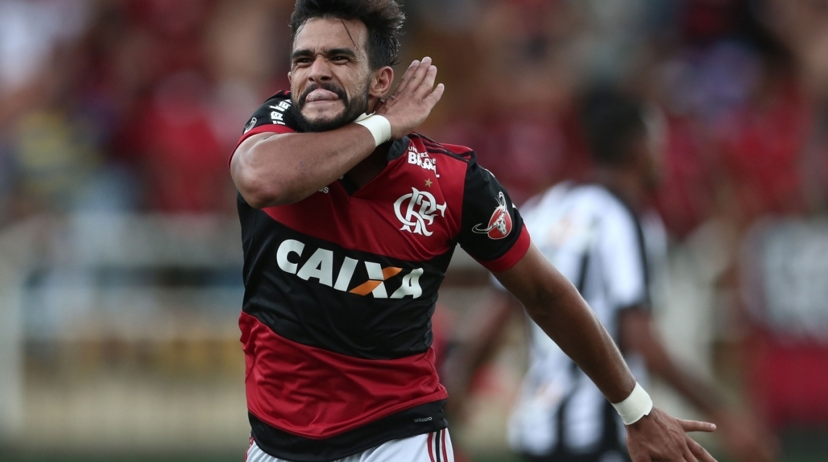 Henrique Dourado, do Flamengo, comemora após marcar gol em partida contra o Botafogo, válida pelas semifinais da Taça Guanabara (1º turno do Estadual do Rio de Janeiro), realizada no Estádio Raulino de Oliveira, em Volta Redonda, neste sábado (10).
Foto: ANDRÉ MOURÃO/AGIF/ESTADÃO CONTEÚDO