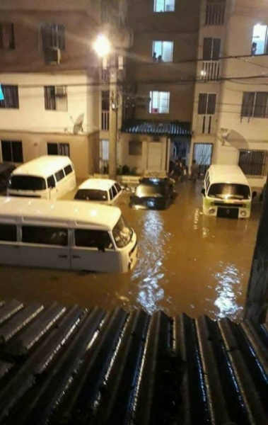 Ruas alagadas no Bairro Carioca, em Triagem