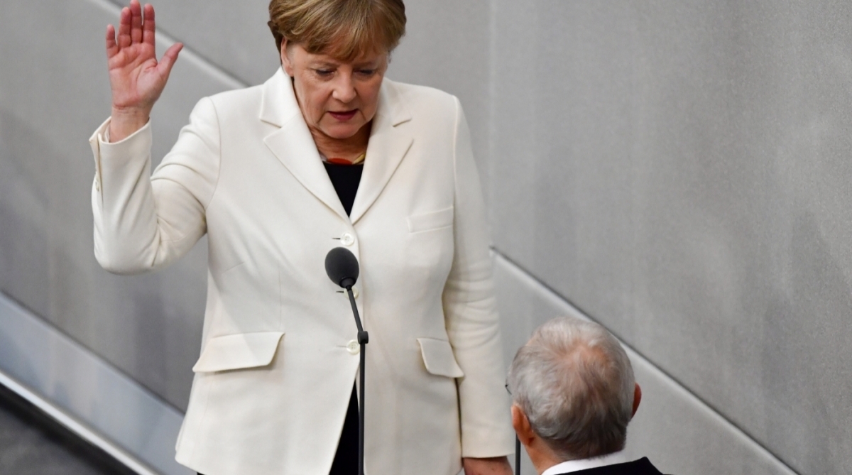 A chanceler alemã, Angela Merkel, prestou juramento para um quarto mandato, que provavelmente será o último em que estará à frente da primeira economia da Europa. - AFP