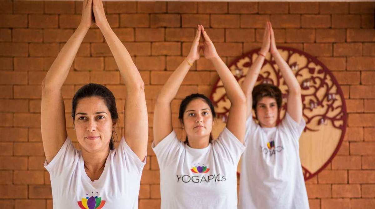Aula de ioga no espaço que fica em Botafogo: bem-estar e gerenciamento do estresse - Estudio JM Fotografia