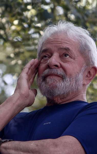 Brazilian ex-president (2003-2011) Luiz Inacio Lula da Silva gestures during a Catholic mass in memory of his late wife Marisa Leticia, at the metalworkers' union building in Sao Bernardo do Campo, in metropolitan Sao Paulo, Brazil, on April 7, 2018.
Brazil's election frontrunner and controversial leftist icon said Saturday that he will comply with an arrest warrant to start a 12-year sentence for corruption. 