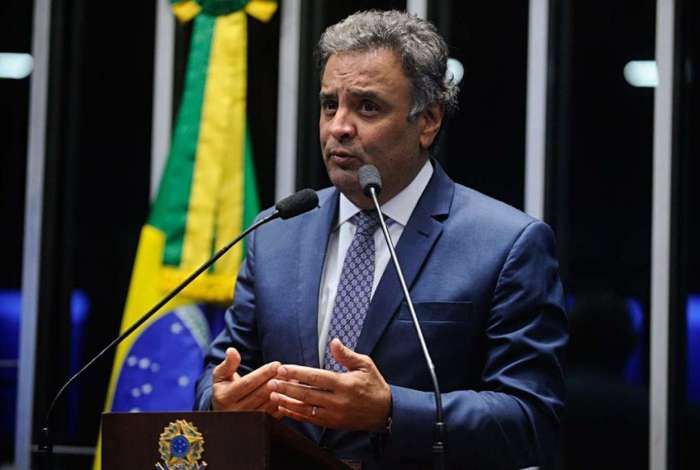 Aécio Neves: réu corrupção e obstrução de justiça