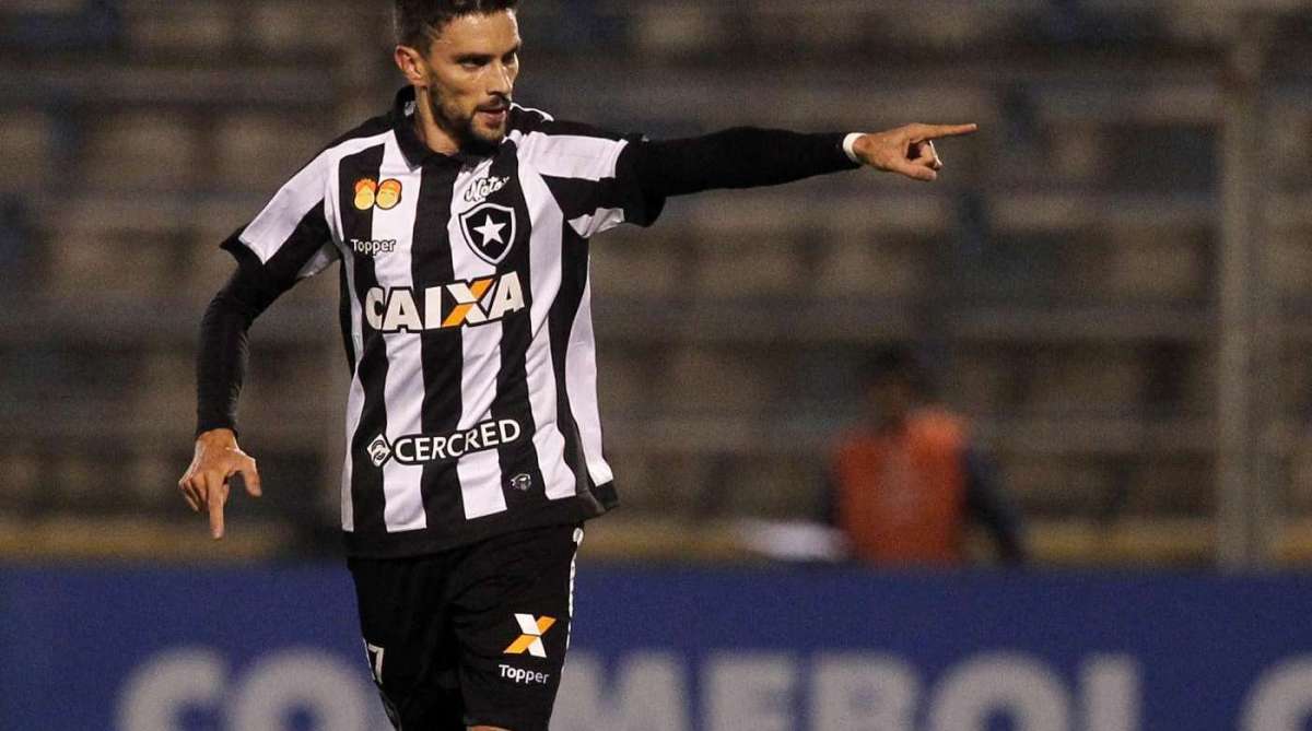 Rodrigo Pimpão comemora seu gol, que garantiu a vitória do Botafogo na estreia na Copa Sul-Americana - AFP