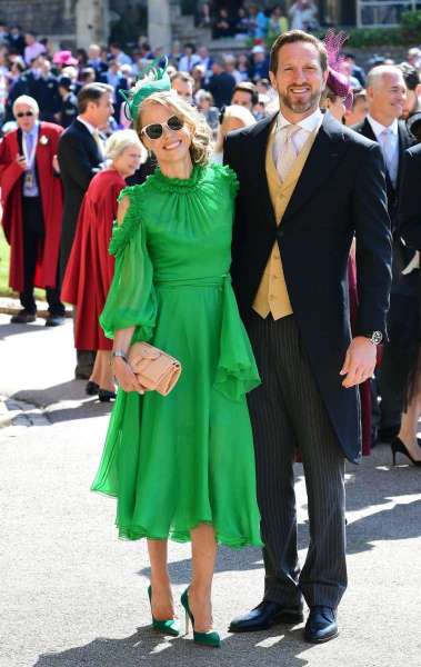 O ex-jogador da Inglaterra de rugby Will Greenwood e sua esposa Caroline posando para foto antes da cerimônia 