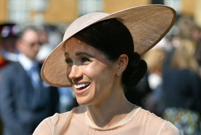 Meghan Markle, a Duquesa de Sussex, participa da festa do 70 aniversrio do Prncipe de Gales, no Palcio de Buckingham, em Londres (Dominic Lipinski)