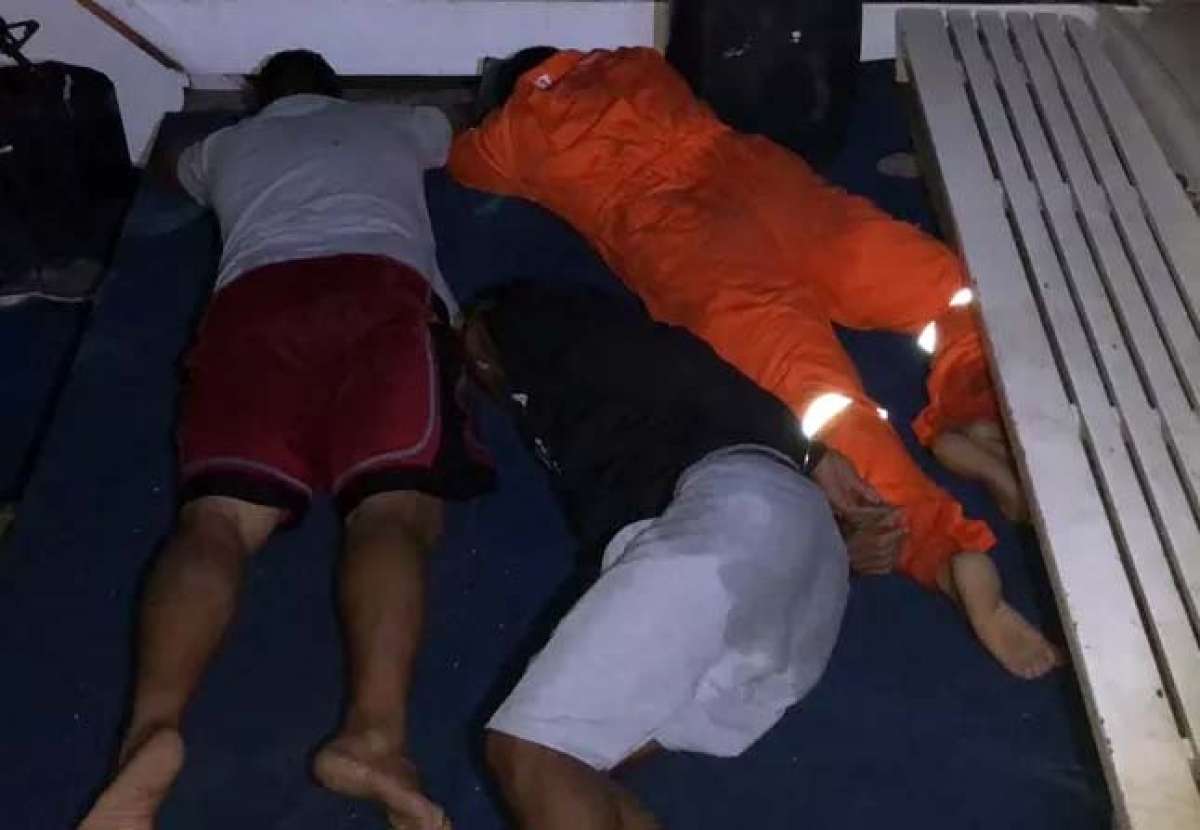 Homens que estavam no barco