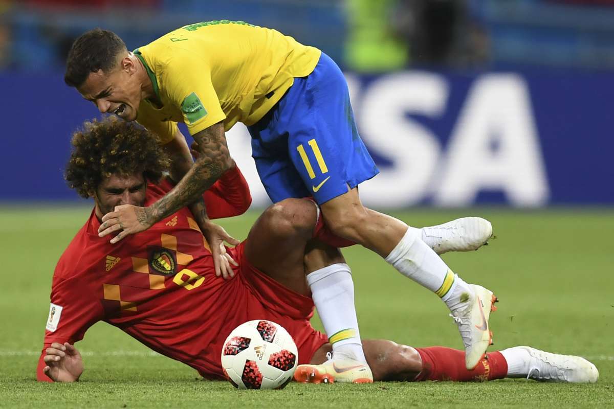 Belgium's midfielder Kevin De Bruyne (L) scores his team's second goal during the Russia 2018 World Cup quarter-final football match between Brazil and Belgium at the Kazan Arena in Kazan on July 6, 2018. / AFP PHOTO / BENJAMIN CREMEL / RESTRICTED TO EDITORIAL USE - NO MOBILE PUSH ALERTS/DOWNLOADS
