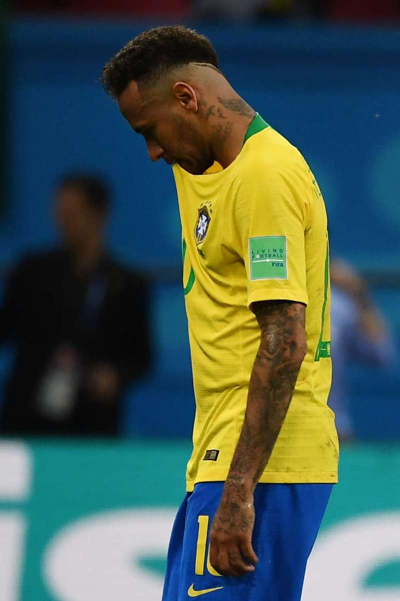 Brazil's forward Neymar reacts during the Russia 2018 World Cup quarter-final football match between Brazil and Belgium at the Kazan Arena in Kazan on July 6, 2018. / AFP PHOTO / Luis Acosta / RESTRICTED TO EDITORIAL USE - NO MOBILE PUSH ALERTS/DOWNLOADS