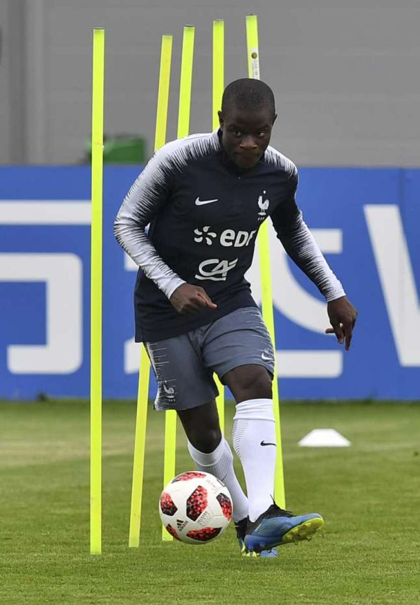 France's midfielder N'Golo Kante passes a ball during a training session at Glebovets Stadium, Istra outside of Moscow on July 4, 2018, during the Russia 2018 World Cup football tournament. / AFP PHOTO / YURI CORTEZ
