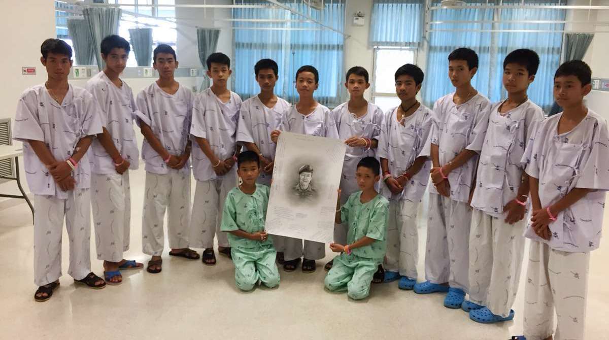 This handout photo released by the Ministry of Health, Chiang Rai Prachanukroh Hospital on July 15, 2018 and taken on July 14 shows members of the rescued 