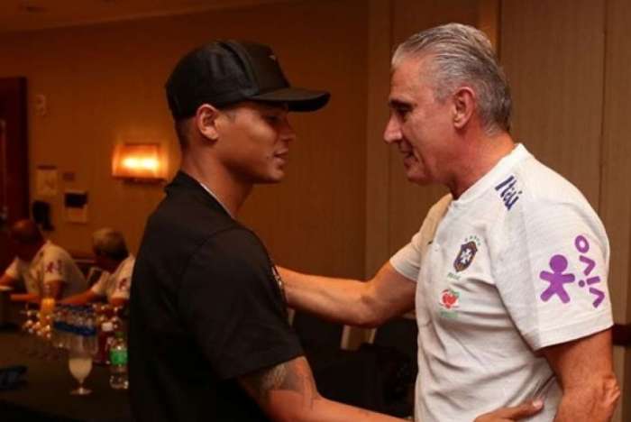 Thiago Silva ao lado de Tite 
