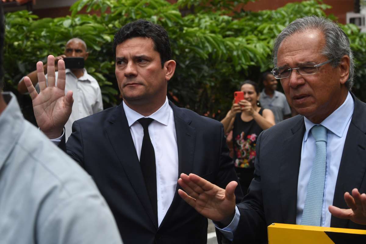 Sergio Moro e Paulo Guedes deixam casa de Jair Bolsonaro  - Mauro Pimentel/ AFP