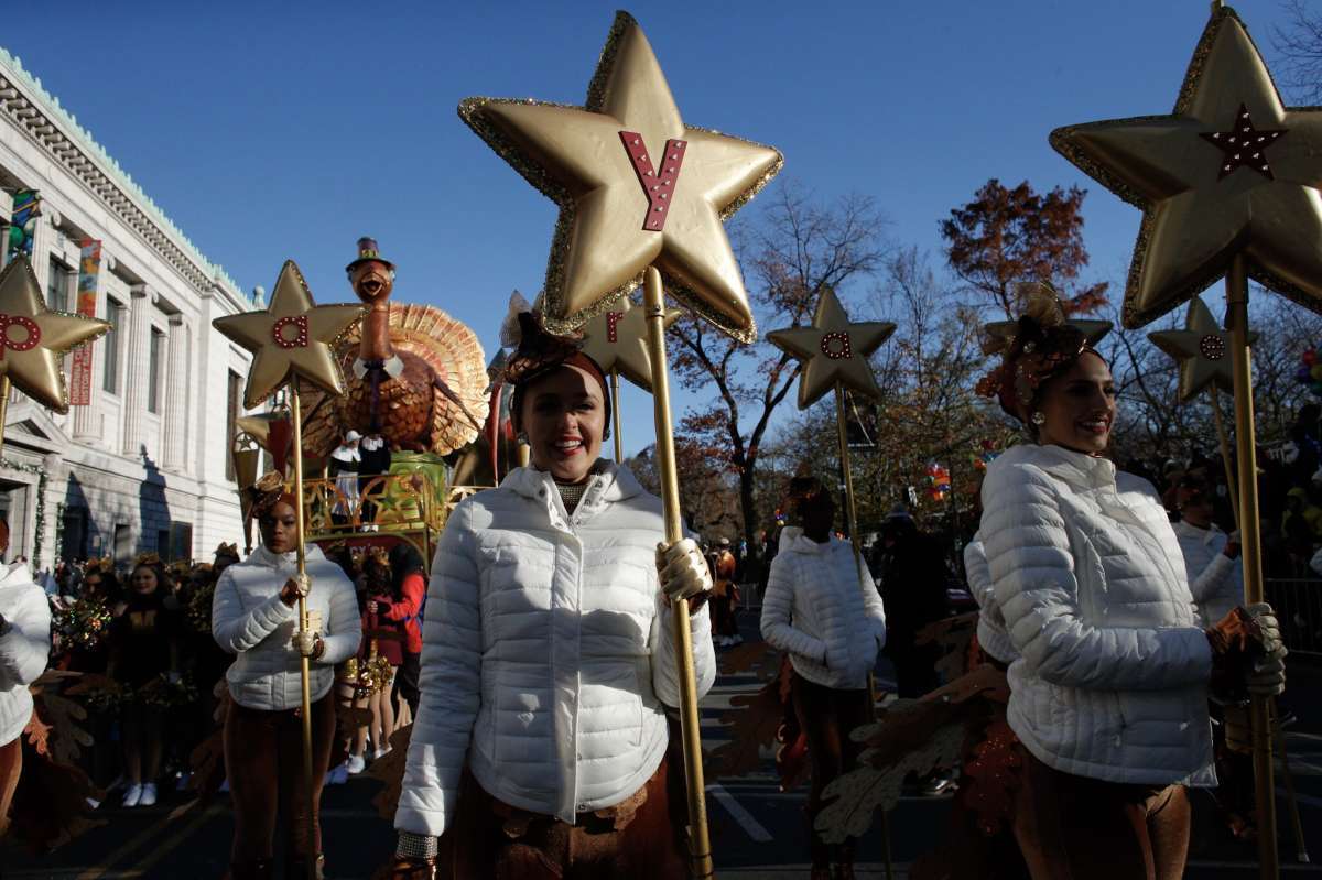 NEW YORK, NY - NOVEMBER 22: A reveller gets ready before the 92nd annual Macys Thanksgiving Day Parade Parade on November 22, 2018 in New York City.   Kena Betancur/Getty Images/AFP