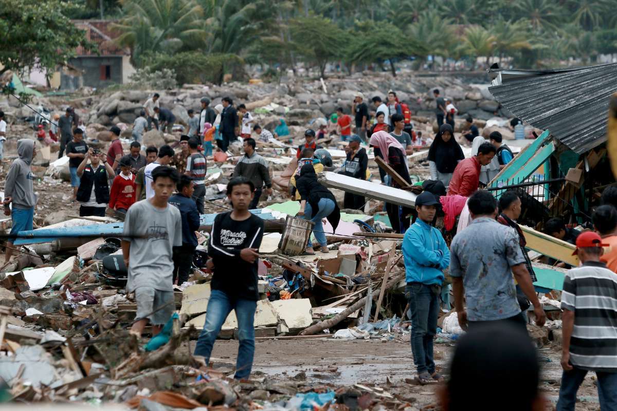 -- AFP PICTURES OF THE YEAR 2018 --

Quake survivors make their way past a washed out passenger ferry in Wani, Indonesia's Central Sulawesi on October 3, 2018, after an earthquake and tsunami hit the area on September 28. - Nearly 1,400 people are now known to have died in the quake-tsunami that smashed into Indonesia's Sulawesi island as UN officials warned the 