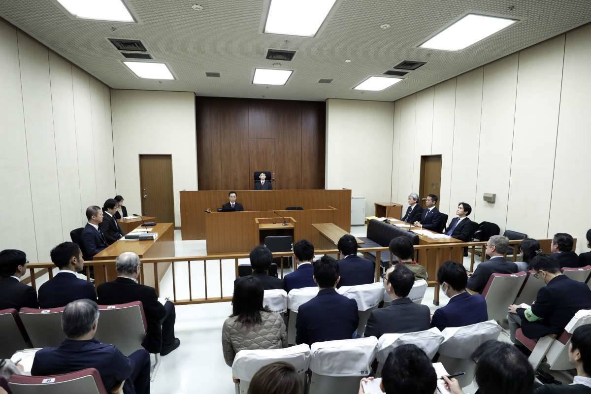 Foi a primeira aparição pública do executivo brasileiro desde sua prisão - Kiyoshi Ota / AFP