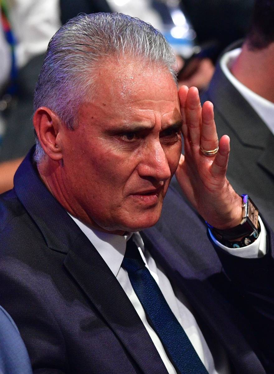 The coach of the Brazilian national football team, Tite, gestures before the start of the 2019 Copa America draw in Rio de Janeiro, Brazil, on January 24, 2019. - The 2019 Copa America will be held in Brazil between June 14 and July 7. (Photo by Carl DE SOUZA / AFP)