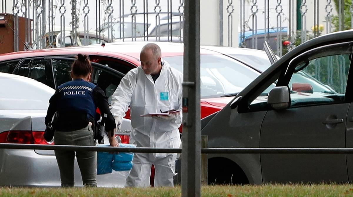 A forensic official works at the Masjid al Noor mosque after a shooting incident in Christchurch on March 15, 2019. - Attacks on two Christchurch mosques left at least 49 dead on March 15, with one gunman -- identified as an Australian extremist -- apparently livestreaming the assault that triggered the lockdown of the New Zealand city. (Photo by Tessa BURROWS / AFP)