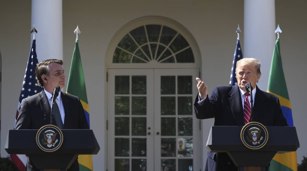 Donald Trump discursa em coletiva de imprensa após encontro bilateral com Bolsonaro - Jim Watson/ AFP