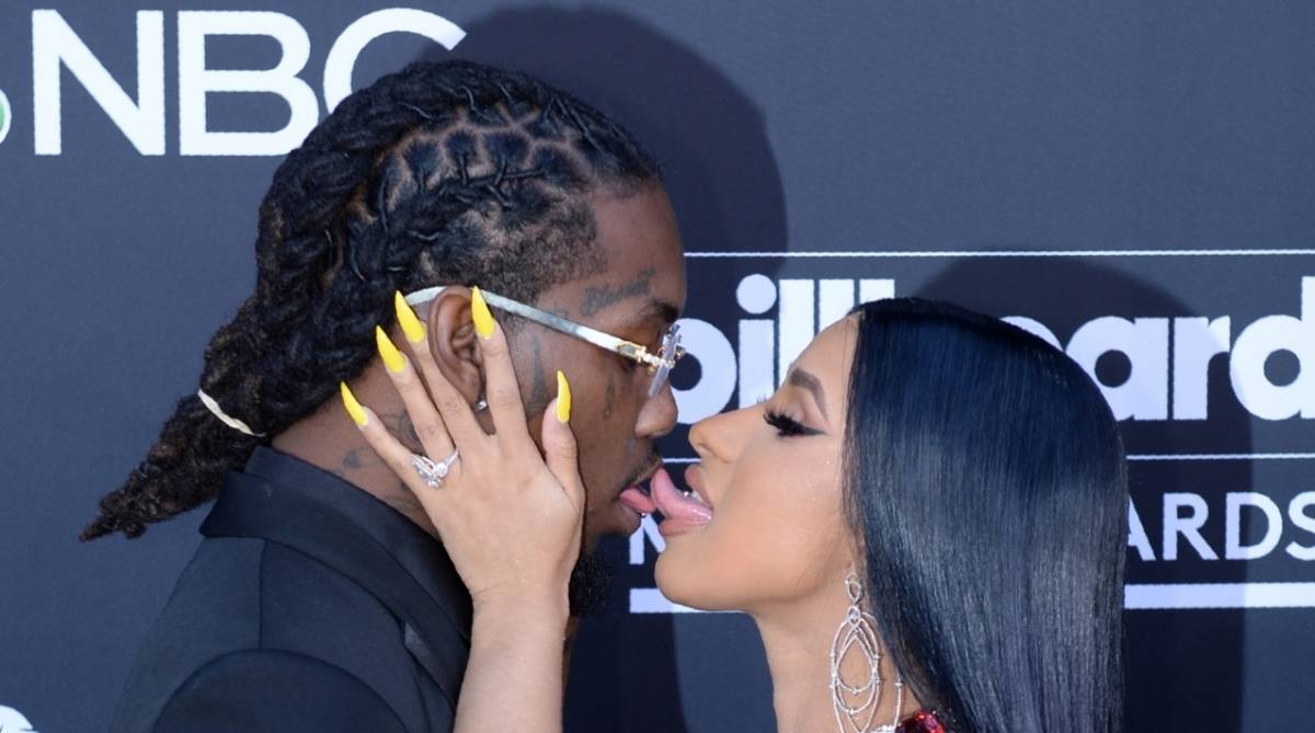 US rappers Cardi B and Offset kiss as they attend the 2019 Billboard Music Awards at the MGM Grand Garden Arena on May 1, 2019, in Las Vegas, Nevada. (Photo by Bridget BENNETT / AFP)