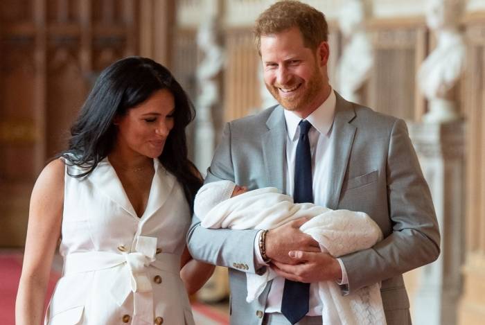 Príncipe Harry e Meghan Markle com o filho - AFP