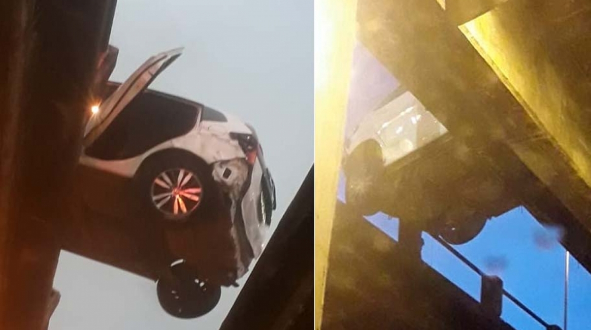 Um dos veículos envolvidos no acidente ficou pendurado - Reprodução / Internet