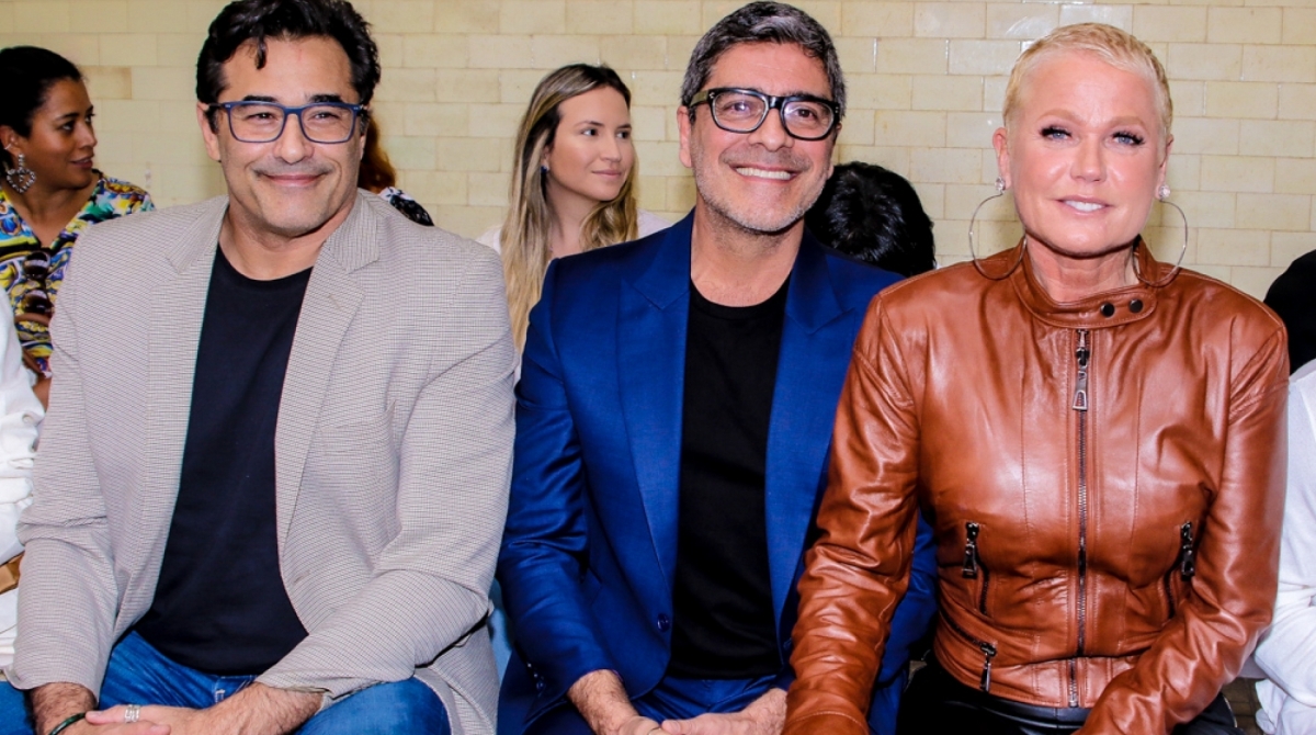 Xuxa, Junno e Luciano Szafir assistem Sasha na passarela 