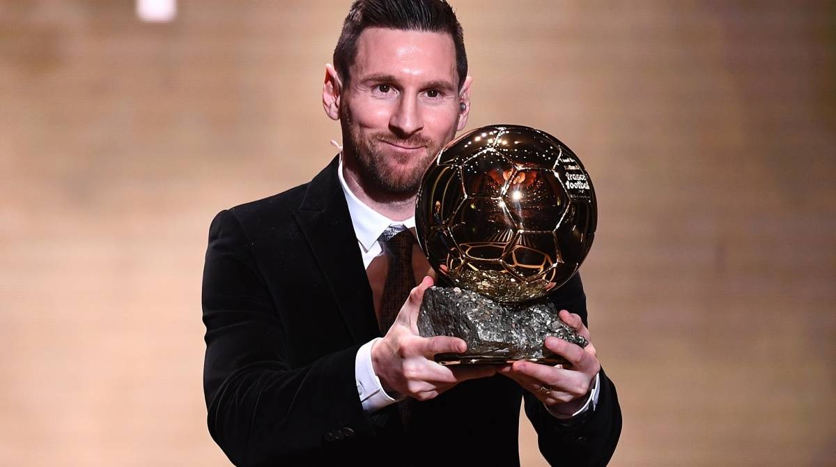 Barcelona's Argentinian forward Lionel Messi reacts after winning the Ballon d'Or France Football 2019 trophy at the Chatelet Theatre in Paris on December 2, 2019. - Lionel Messi won a record-breaking sixth Ballon d'Or on Monday after another sublime year for the Argentinian, whose familiar brilliance remained undimmed even through difficult times for club and country. (Photo by FRANCK FIFE / AFP) - AFP