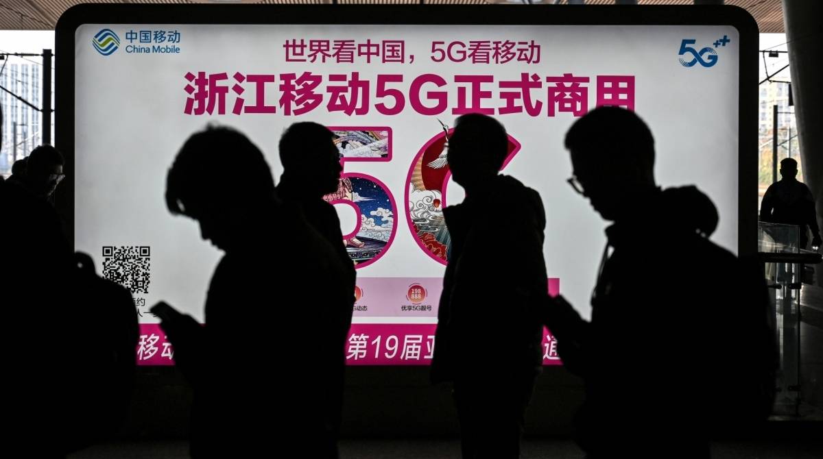 Na China, comércio de amigos virtuais e de casais pode ser encontrado em aplicativos e sites - AFP