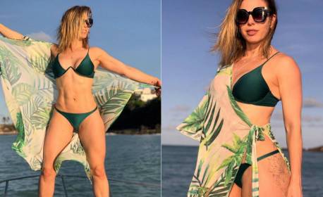 Aos 41 anos, Sheila Mello exibe barriga tanquinho em passeio de barco