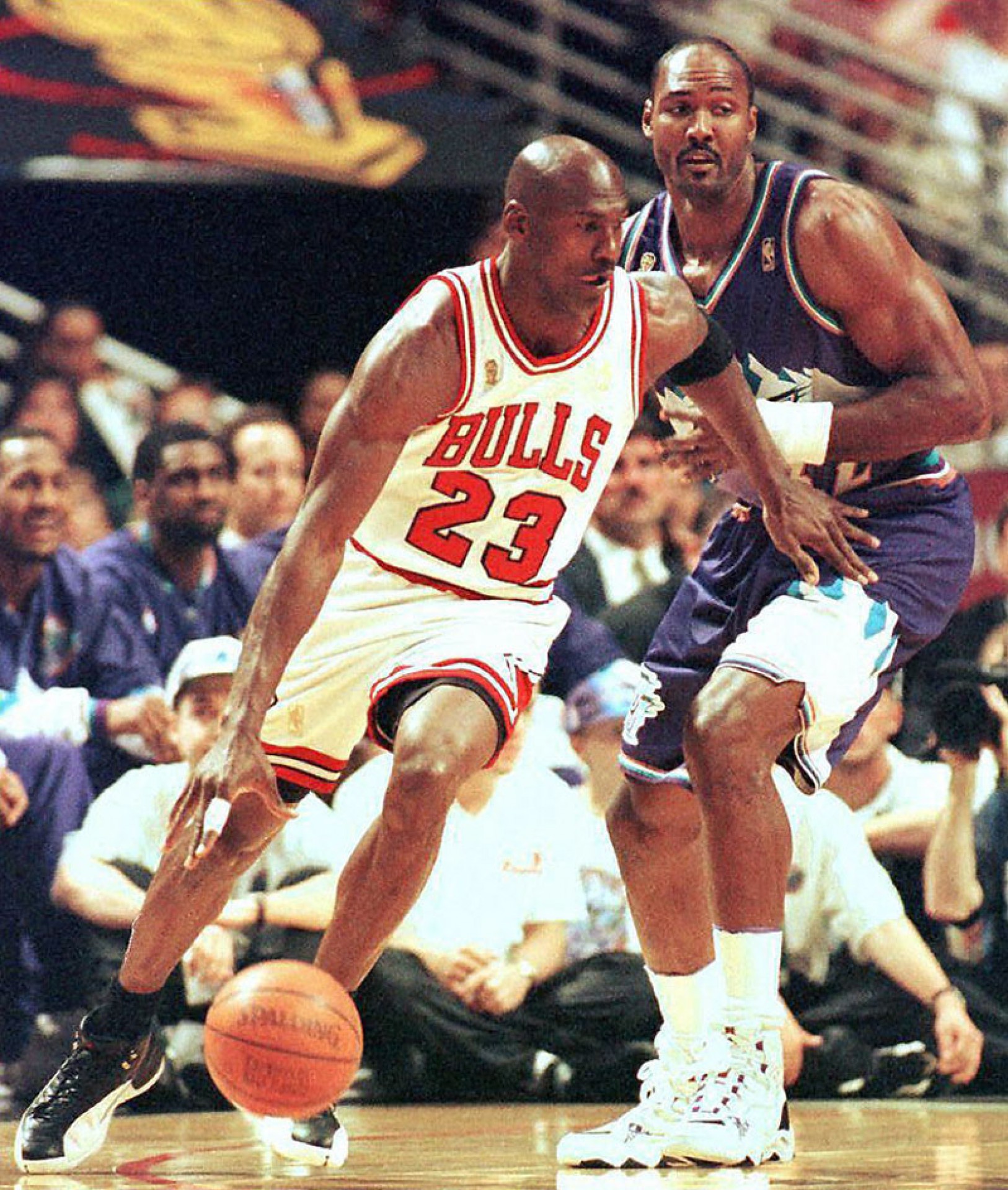 SALT LAKE CITY, UT - JUNE 13:  Michael Jordan (L) of the Chicago Bulls is defended by Karl Malone of the Utah Jazz 13 June during game six of the 1997 NBA Finals at the United Center in Chicago, IL.  (Photo credit should read VINCENT LAFORET/AFP via Getty Images)