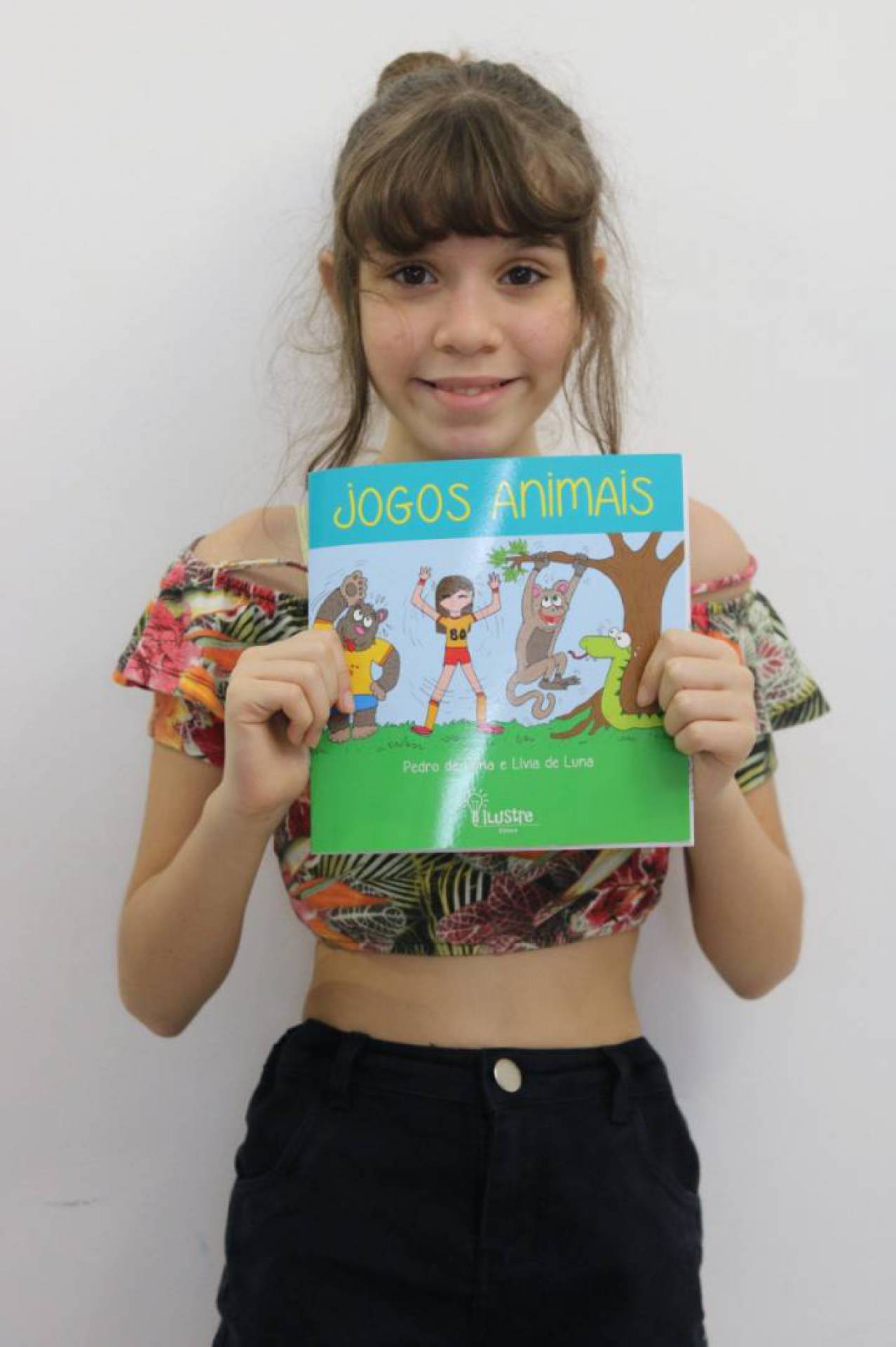 A jovem escritora Livia e sua criação