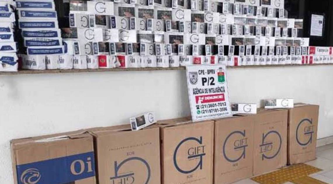 Maços de cigarros contrabandeados em Meriti. - Reprodução