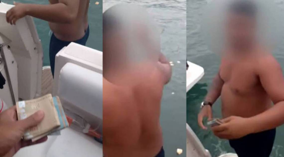 Homem joga dinheiro no mar - Reprodução G1