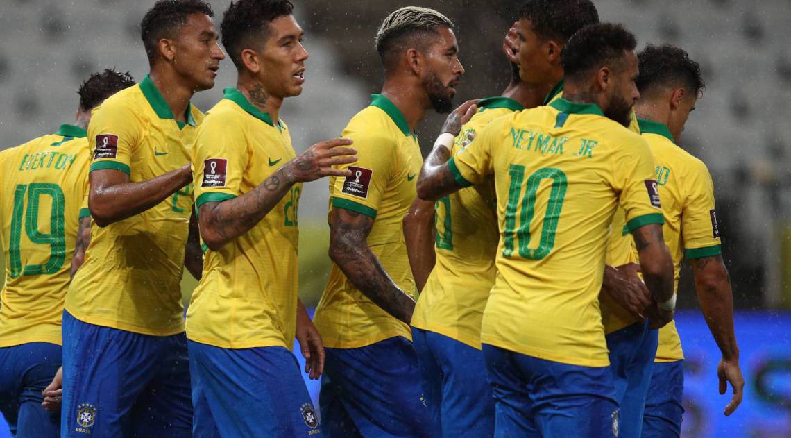 Brazil's players celebrate a goal during the 2022 FIFA World Cup South American qualifier football match against Bolivia at the Neo Quimica Arena, also known as Itaquerao, in Sao Paulo, Brazil, on October 9, 2020, amid the COVID-19 novel coronavirus pandemic. (Photo by Buda Mendes / POOL / AFP) - AFP