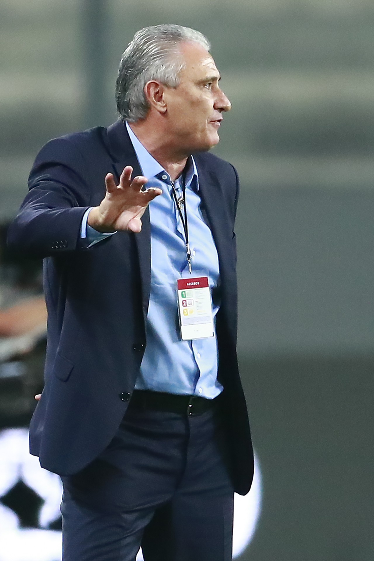 Brazil's coach Tite gives instructions during the 2022 FIFA World Cup South American qualifier football match against Peru at the National Stadium in Lima, on October 13, 2020, amid the COVID-19 novel coronavirus pandemic. (Photo by Daniel APUY / POOL / AFP) - AFP