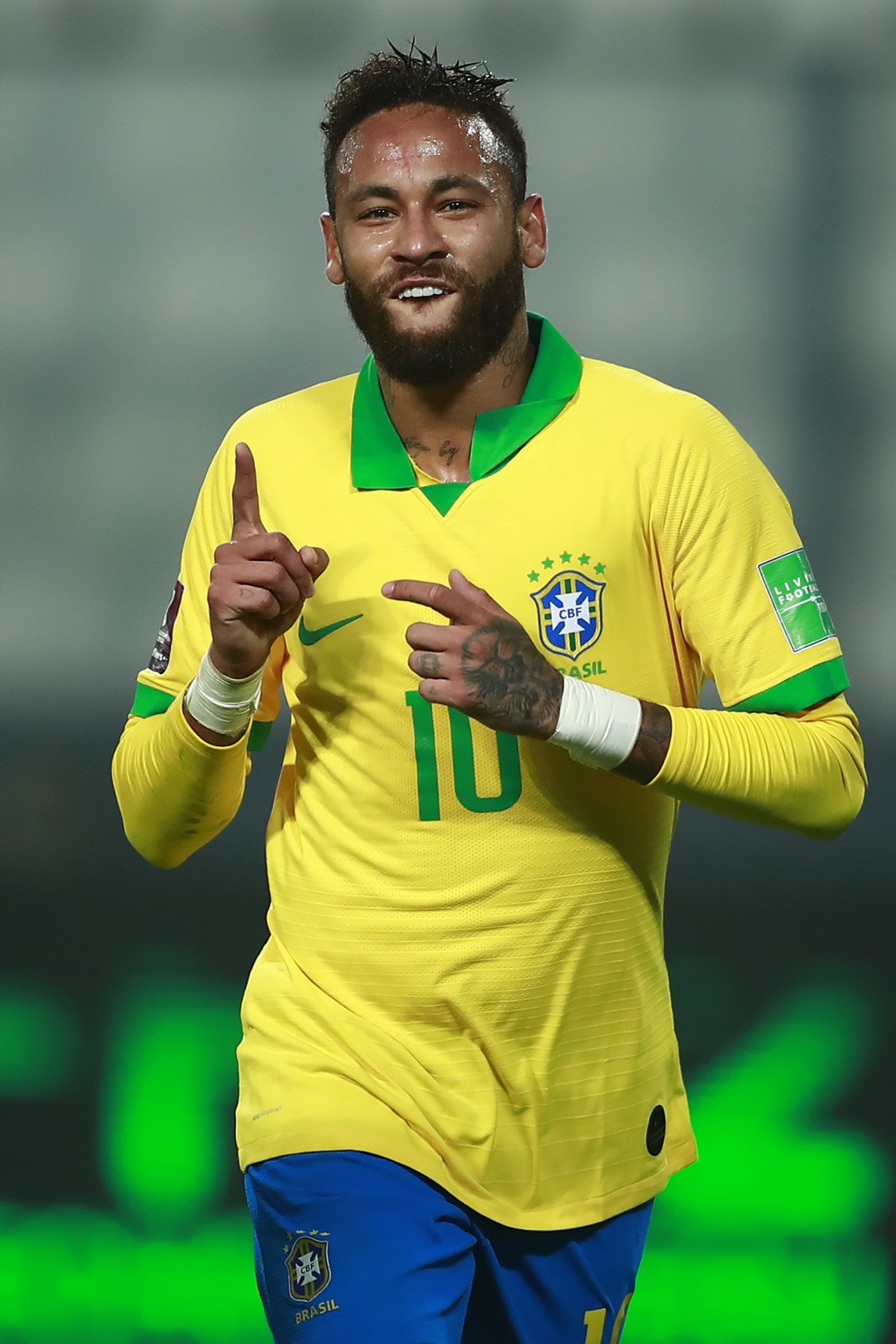 Brazil's Neymar celebrates after scoring a penalty against Peru during their 2022 FIFA World Cup South American qualifier football match at the National Stadium in Lima, on October 13, 2020, amid the COVID-19 novel coronavirus pandemic. (Photo by Daniel APUY / POOL / AFP) - AFP