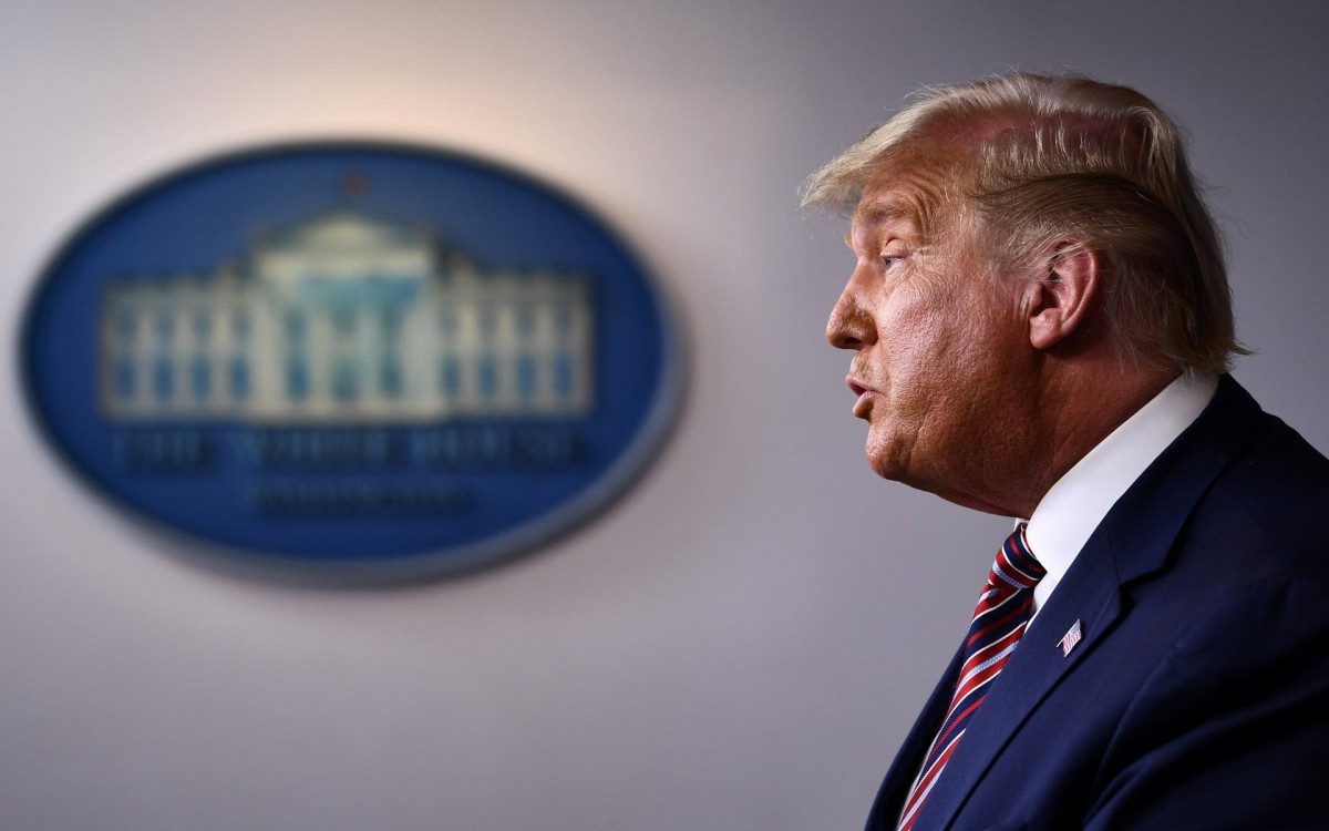 Presidente Donald Trump em conferência na noite de quinta-feira - AFP
