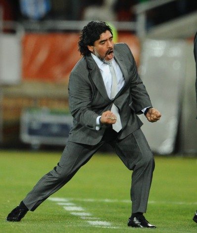 (FILES) In this file photo taken on June 22, 2010 Argentina's coach Diego Maradona celebrates after Argentina's defender Martin Demichelis (not pictured) scored during the Group B first round 2010 World Cup football match Greece vs Argentina at Peter Mokaba stadium in Polokwane. - Argentine football legend Diego Maradona has died at the age of 60, his spokesman announced on November 25, 2020.
Renowned with Brazil's Pele as one of the greatest footballers of all time, the Argentine World Cup winning captain died of a heart attack, having undergone brain surgery earlier this month, a member of his entourage told AFP. (Photo by François-Xavier MARIT / AFP) - AFP