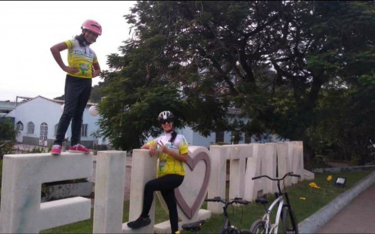 Esposa com a filha de Israel Pimenta.