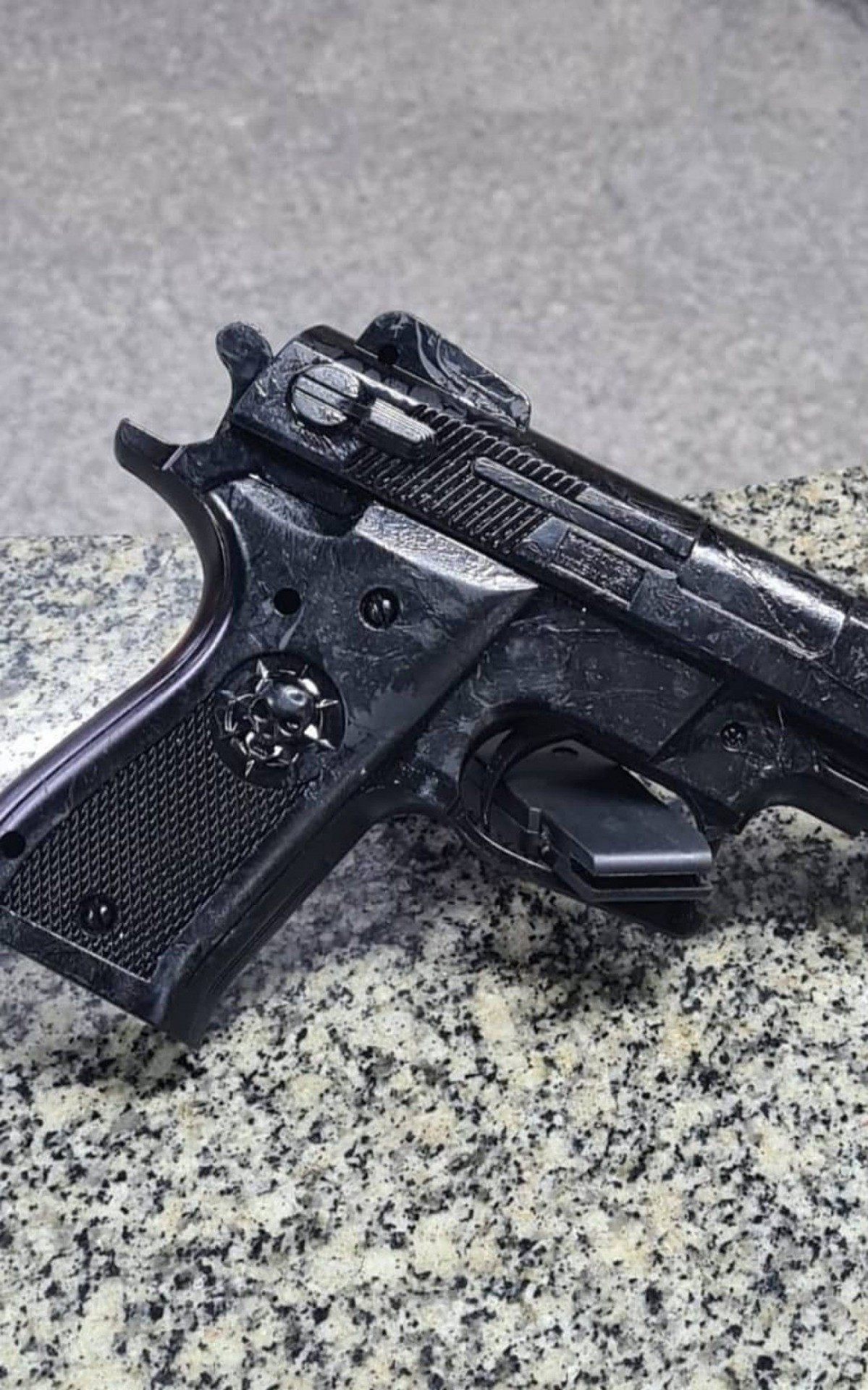 Arma apreendida na a&ccedil;&atilde;o