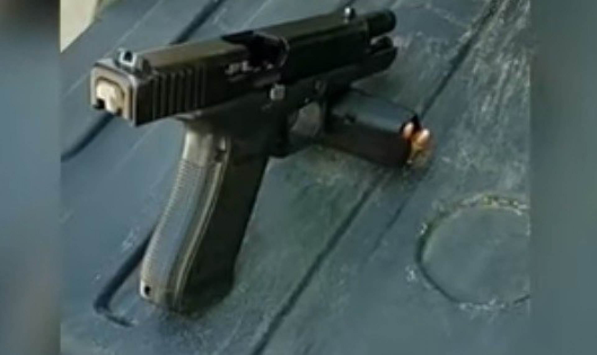 Pistola encontrada com o motorista do caminhão roubado