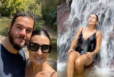 De maiô, Fátima Bernardes se refresca em cachoeira