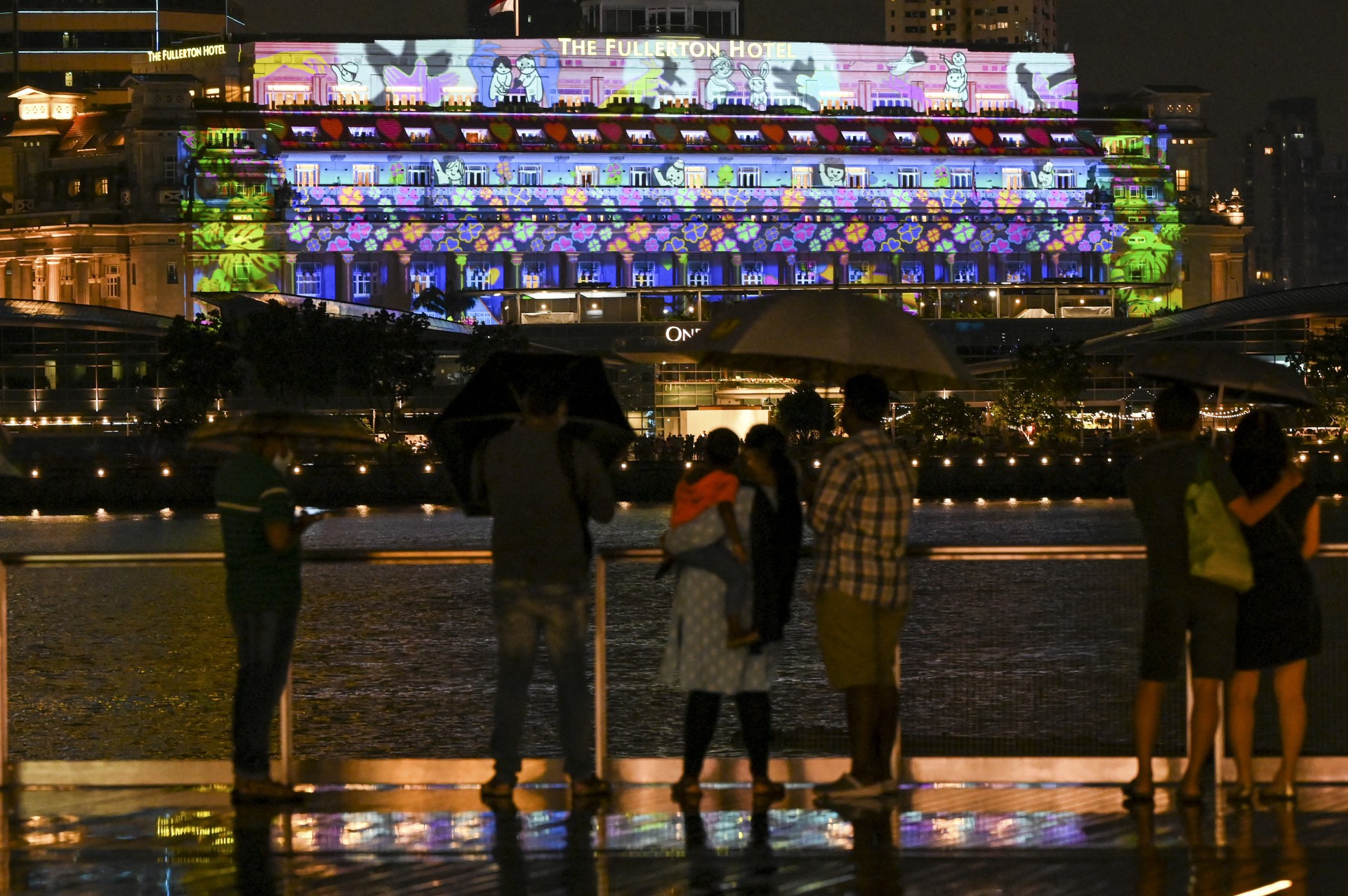Registros da celebração do Ano Novo em Singapura - ROSLAN RAHMAN / AFP