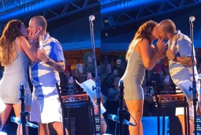 Vídeo! Paolla Oliveira e Diogo Nogueira dão beijão de tirar o fôlego em show