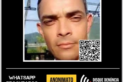 Cartaz pede ajuda para encontrar autor de feminicídio