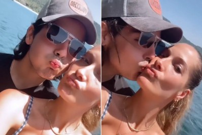 Filho de Faustão curte passeio de barco coladinho com namorada